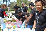 Adobe volunteers serve refreshments during Achievement Day